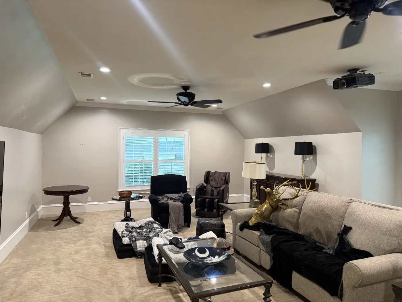 Bonus room with a vaulted ceiling repainted in warm greige in a Columbia SC home